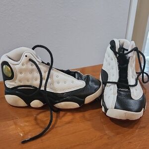 Jordan Black and White Sneakers with Holographic Detail